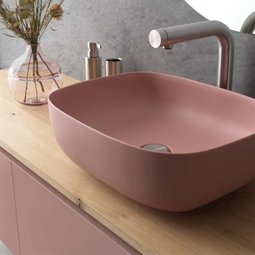 lyserød håndvask til bordplade