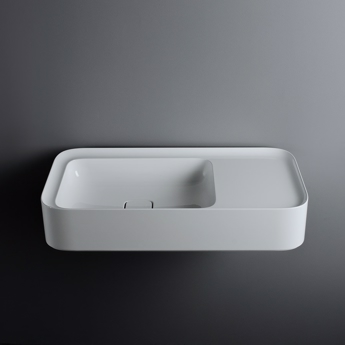 Firkantet håndvask med lille bordplade til højre eller venstre side