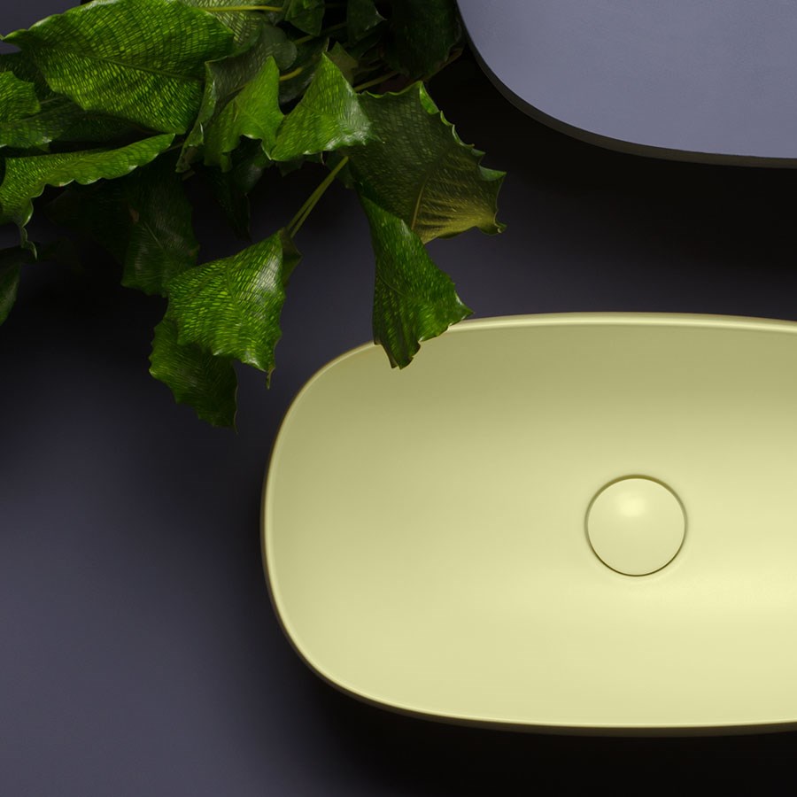 Gul håndvask til placering på bordplade i ovalt design