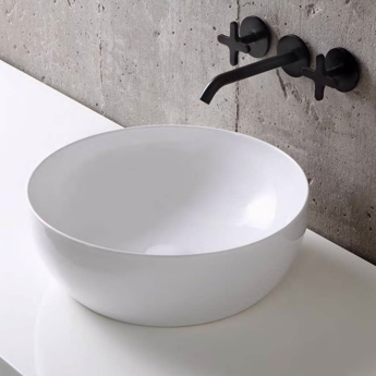 Rund håndvask i eksklusivt rundt design i hvid porcelæn