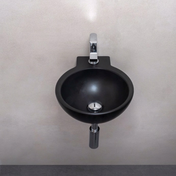 Håndvask i sort og rund design for plassering på væg