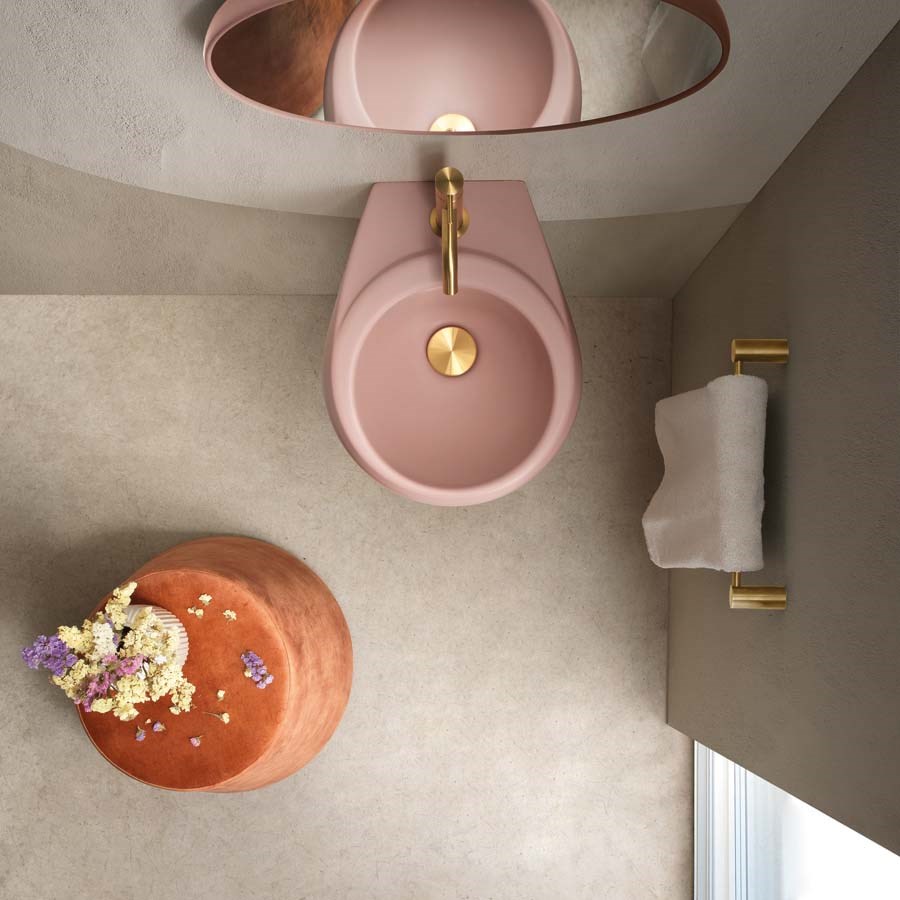 Mat lyserød håndvask i rundt design til badeværelset