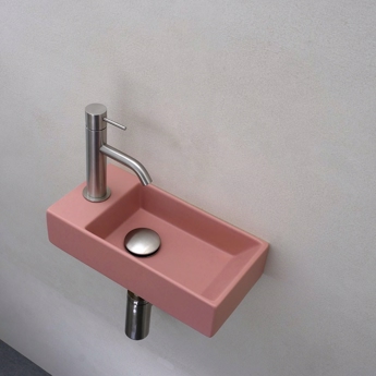 Lille lyserød håndvask til det lille Toilet eller badeværelse